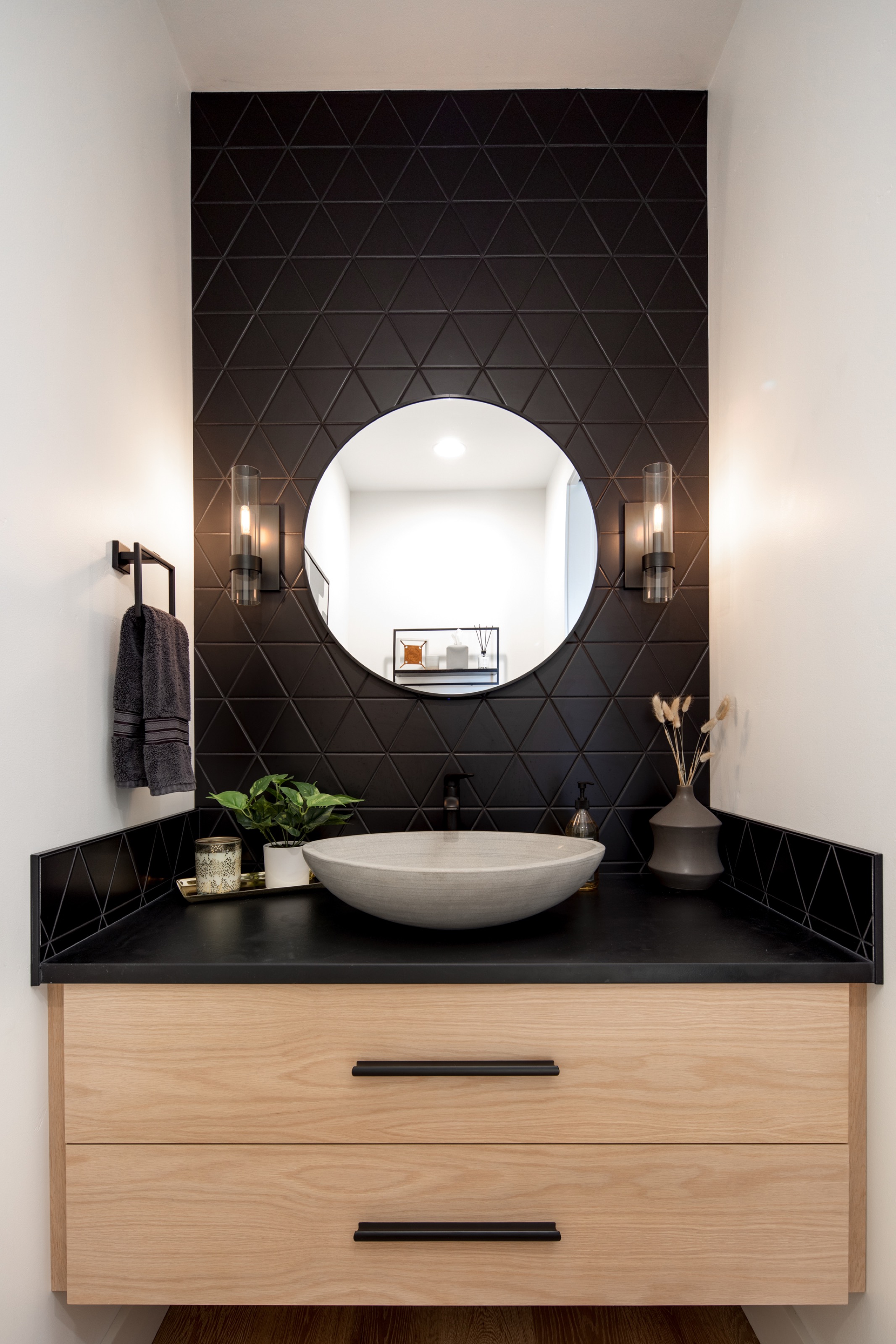 Desert modern home bathroom single vanity with black triangle tile